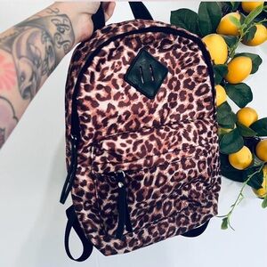 Leopard print small backpack purse